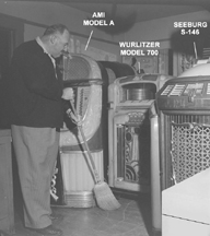 Harold Meier sweeping in his jukebox treasure house