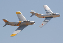 MiG-15 and USAF F-86 Sabre together   
