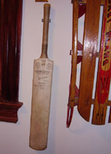 John Edrich Cricket bat on the North wall of my Office